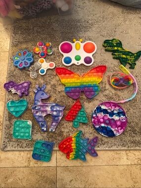 Whole Lot! Rainbow Butterfly & Assorted Silicone Pop-It Fidget Toy Set.